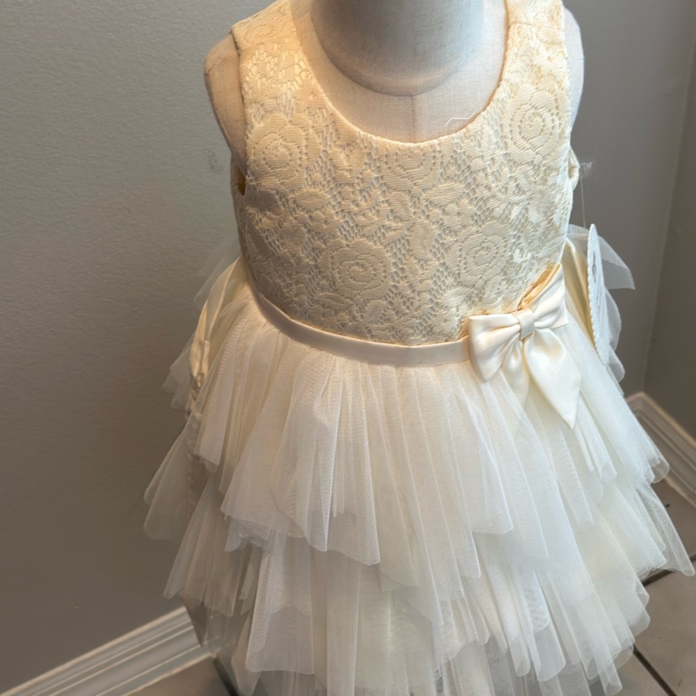 Cream dress with overcoat